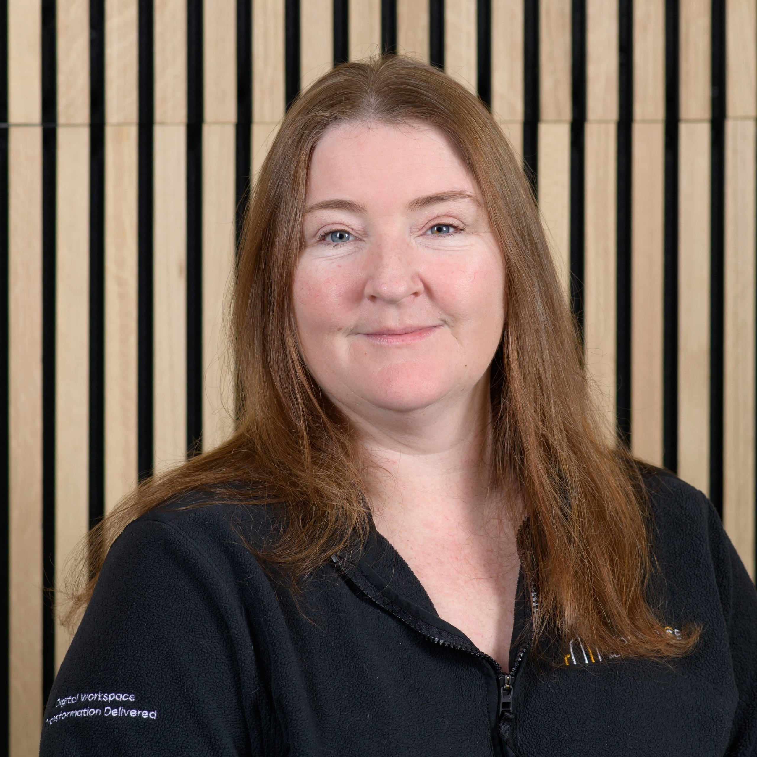 woman with long hair wearing a black shirt
